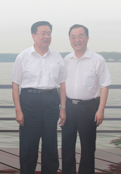 山东聊城组织部副部长谭学国一行访问77779193永利光电，并受到王国生省长接见